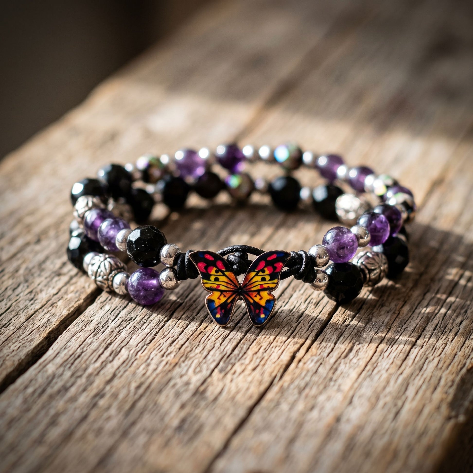 Close-up of a small purple amethyst crystal bracelet with silver butterfly clasp on textured wooden table, emphasizing delicate craftsmanship and peaceful mood.